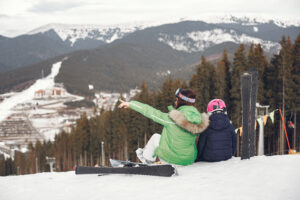 mother-with-daughter-skiing-people-snowy-mountains.jpg