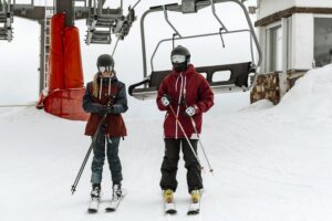 full-shot-skiers-near-chairlift.jpg